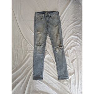 American Eagle ripped washed jeans